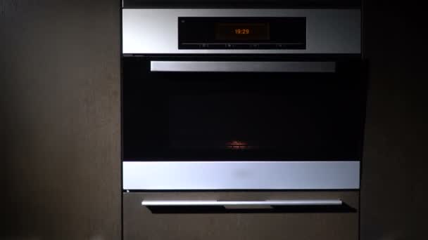 Open the door of the electric oven. slow motion - Footage, Video
