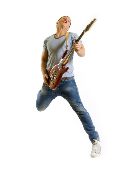 vášnivé kytarista skáče do vzduchu - Fotografie, Obrázek