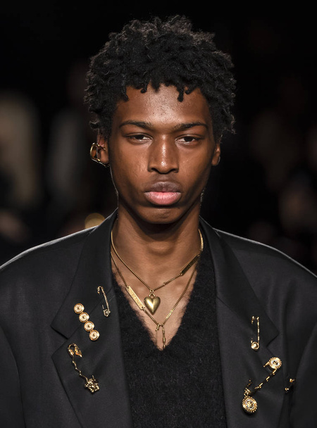 NEW YORK, NY - December 02, 2018: A model walks the runway at the Versace Pre-Fall 2019 Runway Show - 写真・画像