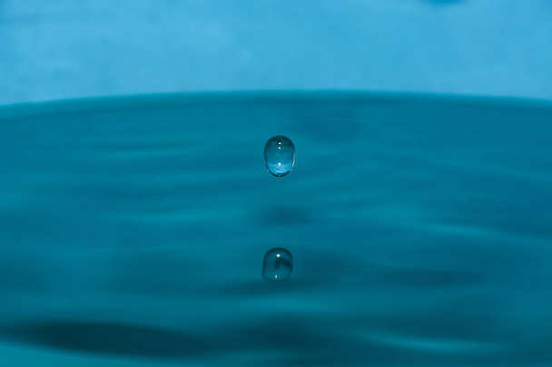 drop of clean blue water - Фото, зображення