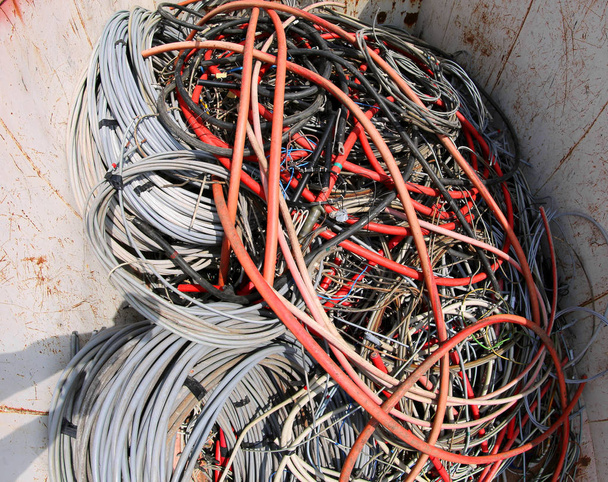 big electric cables in a container of a landfill - Photo, Image
