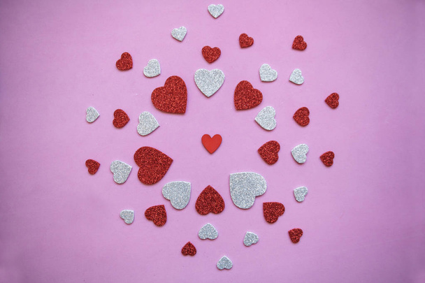 Pattern of many hearts on a pink background - Fotografie, Obrázek