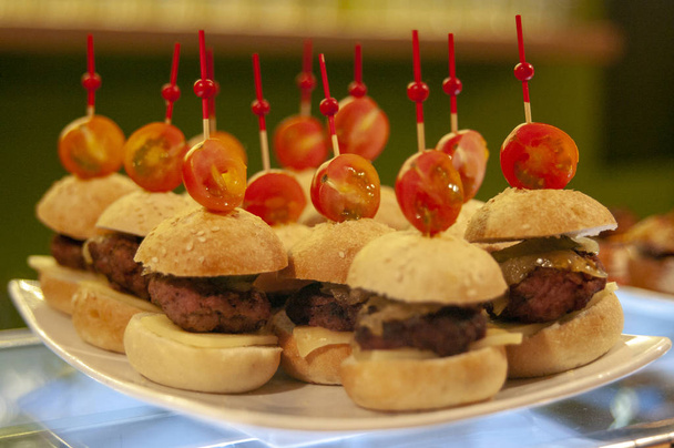 Mini burgers with cherry tomato - Photo, Image