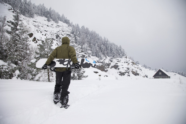 Snowboarder with Snowboards - Photo, Image