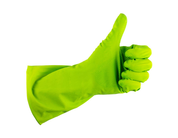 Dłoń w rękawicy zielony ochronnym na białym tle na białym tle ze ścieżką przycinającą. Rękawicą z zatwierdzonych kciuk w górę i pokazano ok - Zdjęcie, obraz
