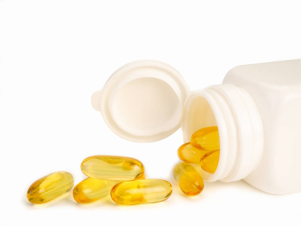 Cod liver oil omega 3 gel capsules on white background. - Photo, Image