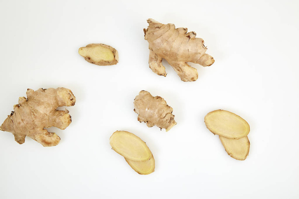 Fresh ginger root spice or rhizome isolated on white background - Foto, afbeelding