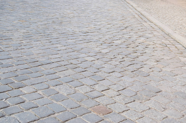 Grey Old Pavement Top View or Granite Cobblestone Road. Ancient Brick Cobblestoned Floor or Granite Tiles Street with Big Stones - Photo, Image