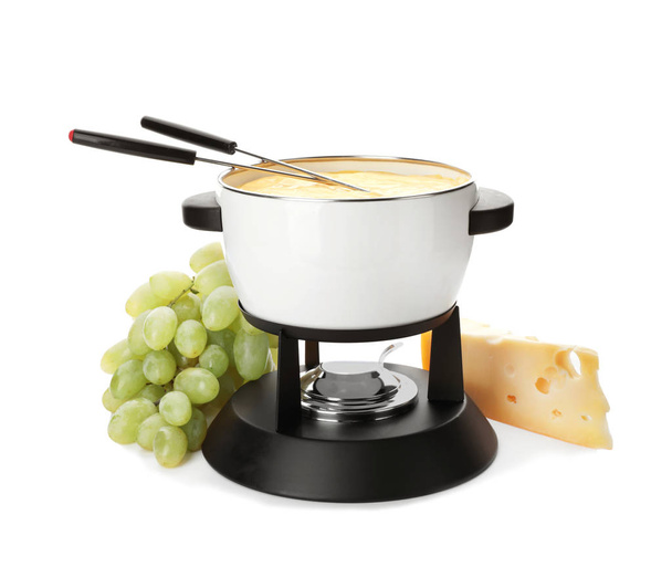 Composition with pot of delicious cheese fondue on white background - Фото, изображение