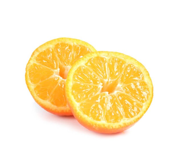 Cut ripe tangerine on white background. Citrus fruit - Foto, Imagem