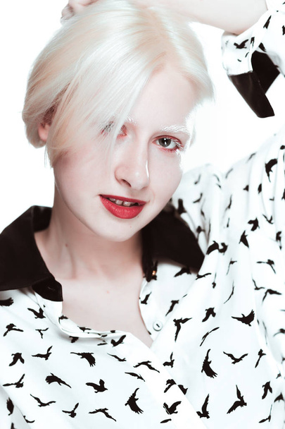 portrait of blonde albino girl in studio. - Фото, изображение