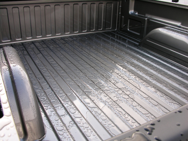 Rain drops on the cargo bed. - Photo, Image