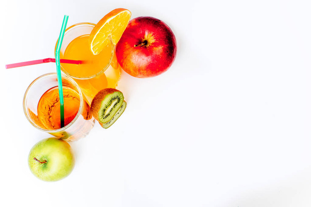 different fruit and juice or smoothie in a glass - Foto, Bild