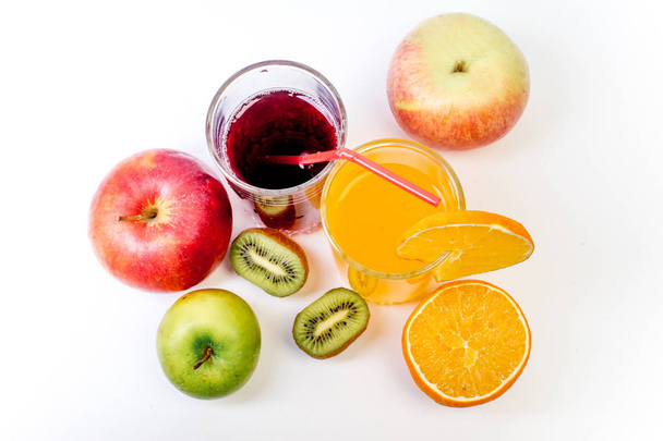 different fruit and juice or smoothie in a glass - Zdjęcie, obraz