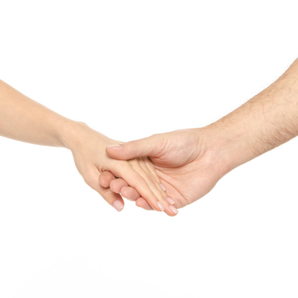 Couple hands held together male female hands - Foto, Imagem