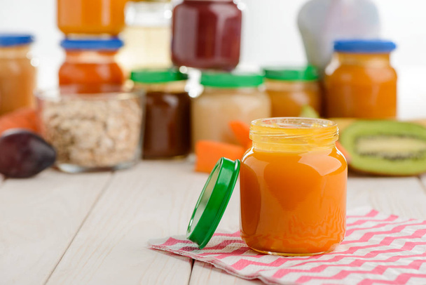 Opened jar of pumpkin puree - Фото, изображение