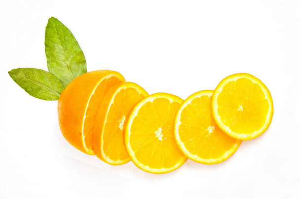 citrus round slices on a white background - Fotó, kép