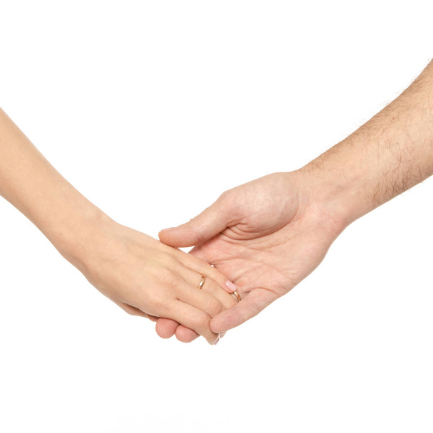 Δυο χέρια συγκρατούνται αρσενικό θηλυκό χέρια - Φωτογραφία, εικόνα