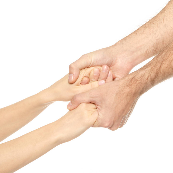 einem Paar helfende Hände geben Maleon weißen Hintergrund Isolation - Foto, Bild