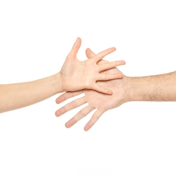 Δυο χέρια συγκρατούνται αρσενικό θηλυκό χέρια - Φωτογραφία, εικόνα