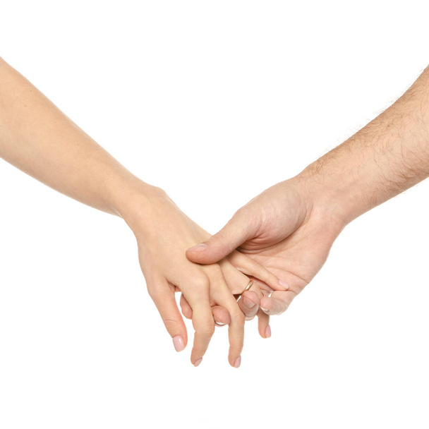 Pár kéz tartja össze a férfi női kezek - Fotó, kép