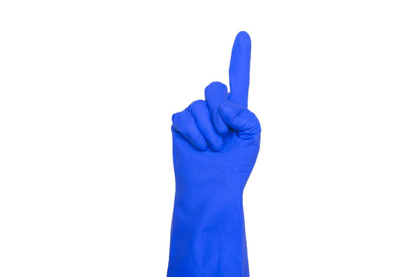 Signs made of blue protective gloves. Fingers symbol one. Isolated on white. The concept of cleanliness and order. - 写真・画像