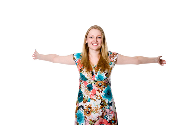 Portrait of cute young lady spreading her arms - Photo, Image