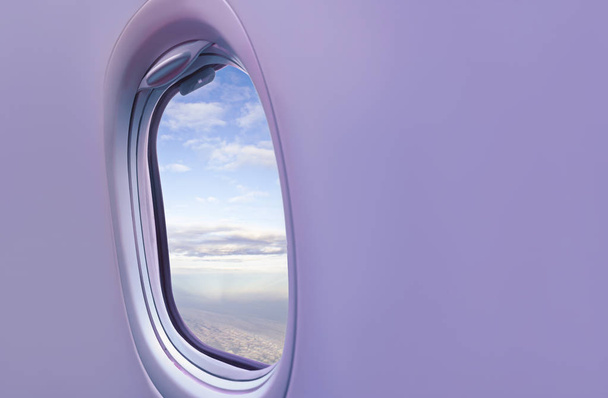 Airplane window with clouds. Background on the theme of tourism and travel - Photo, image