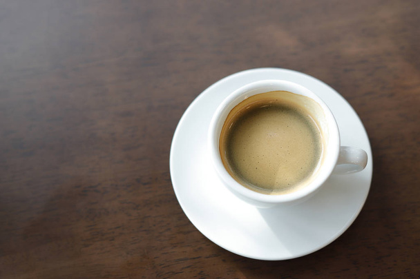 Espresso coffee  in wooden, black background. - Foto, Imagem