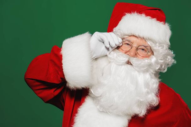 A close up portrait of Santa Claus. Merry Christmas and Happy New Year! - Photo, Image
