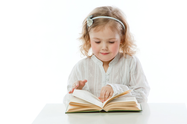 Criança com um livro
 - Foto, Imagem