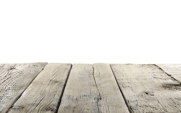 Lege houten tafel oppervlak op witte achtergrond - Foto, afbeelding