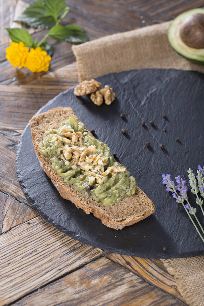 tasty healthy toast with avocado for breakfast - Fotoğraf, Görsel
