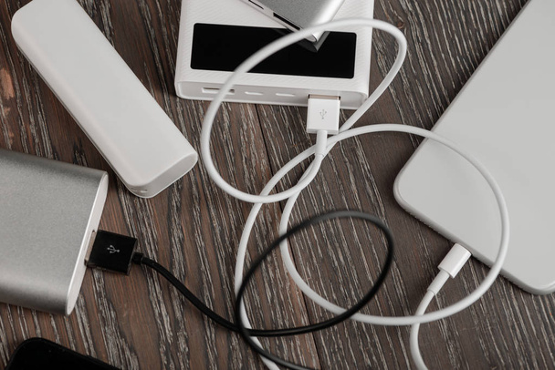 Few power banks with cables - Photo, Image