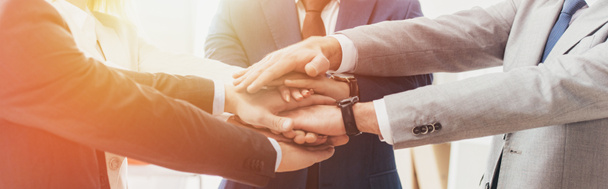 cropped shot of professional successful business people stacking hands together   - Photo, Image