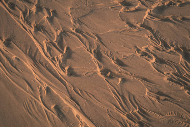 Close-up van zand textuur als achtergrond - Foto, afbeelding