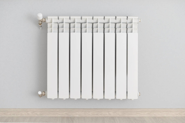 white steel heating radiator on the wall with blue wallpaper - Фото, изображение