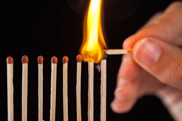 group of burn and unburned matches, isolated on black background. - Photo, Image
