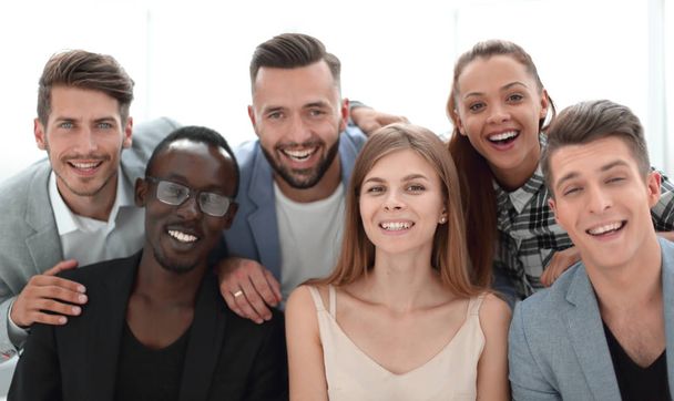 Group of young executives smiling at camera during a work meetin - Foto, Imagem