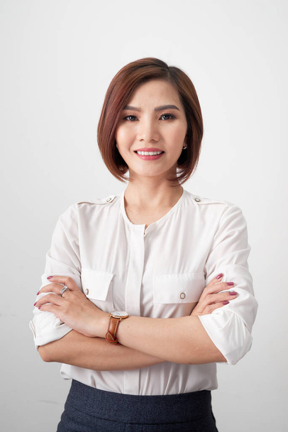 portrait of successful businesswoman looking at camera on white background - Φωτογραφία, εικόνα