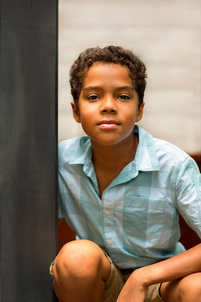 Portarit of a young mixed race little boy. - Фото, изображение