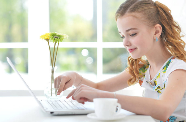 little girl with modern laptop - Zdjęcie, obraz