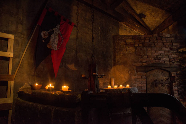 RIGA, LATVIA: The interior of an old building with candles. Retro vintage style. Riga city historical centre is a UNESCO World Heritage Site - Photo, Image