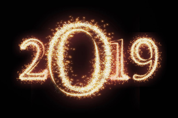 2019 written with Sparkle firework on dark background, Happy new year celebration and greeting cards concept - Photo, Image