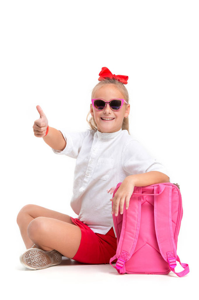 Full length portrait of cute little kid in stylish sunglasses looking at camera and smiling - Foto, Imagem