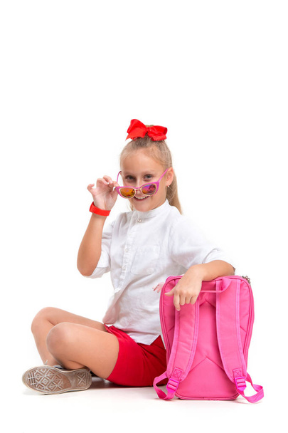 Full length portrait of cute little kid in stylish sunglasses looking at camera and smiling - Fotografie, Obrázek