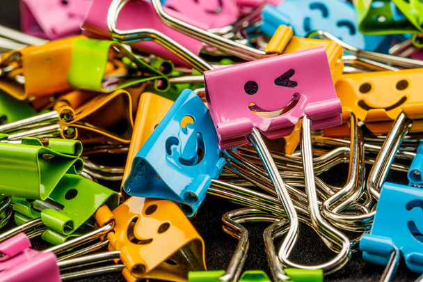 Closeup of pile of colorful binder clips - Photo, Image