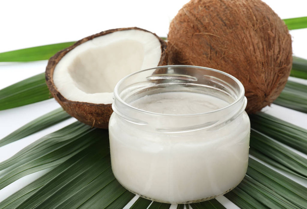 Jar with coconut oil on white background - Φωτογραφία, εικόνα