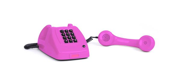 Vintage ροζ τηλέφωνο με λευκό φόντο - Φωτογραφία, εικόνα
