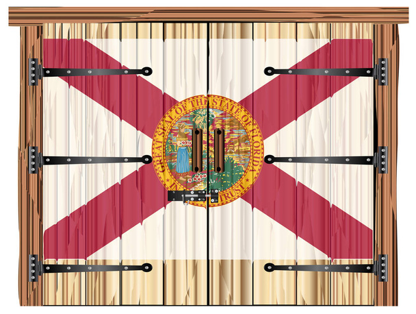 Ein großes geschlossenes hölzernes Scheunentor mit Riegel und Scharnieren und die Florida-Flagge aufgemalt - Vektor, Bild